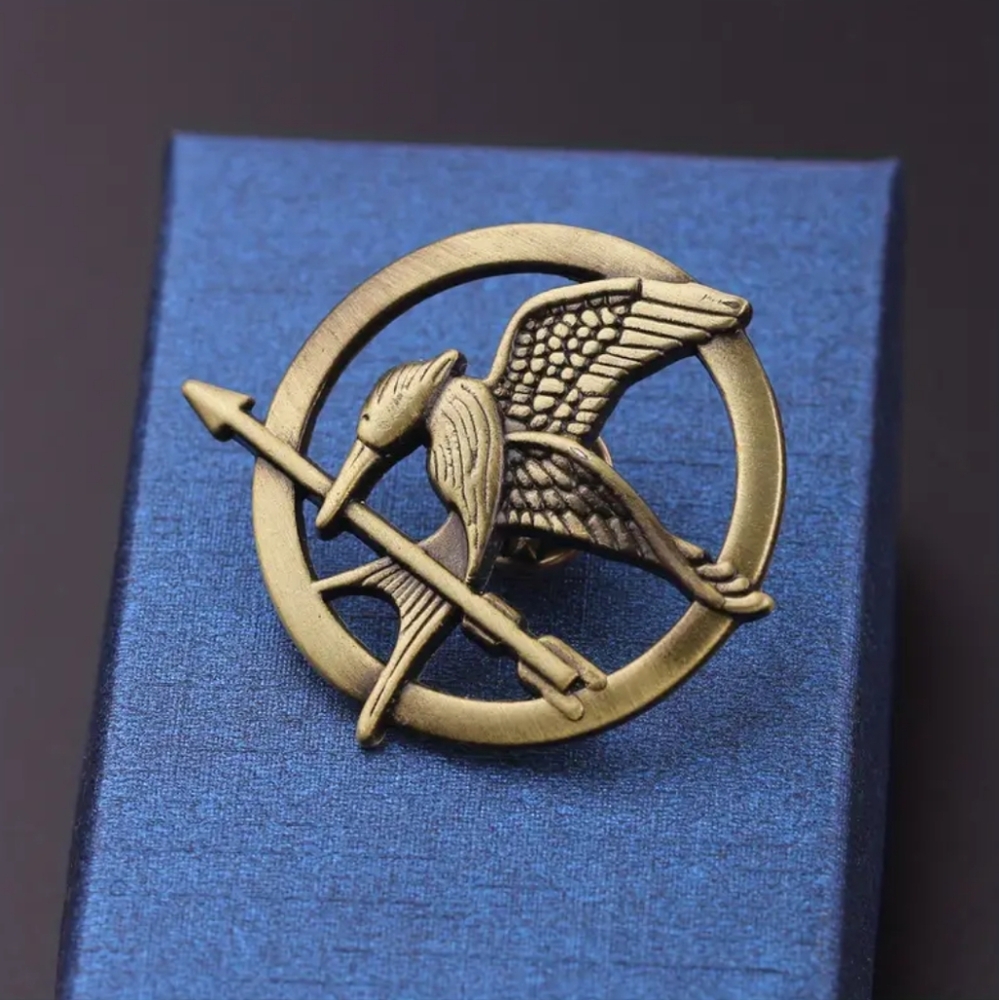 🍉5 for $25* Hunger Games Mockingjay Brooch
